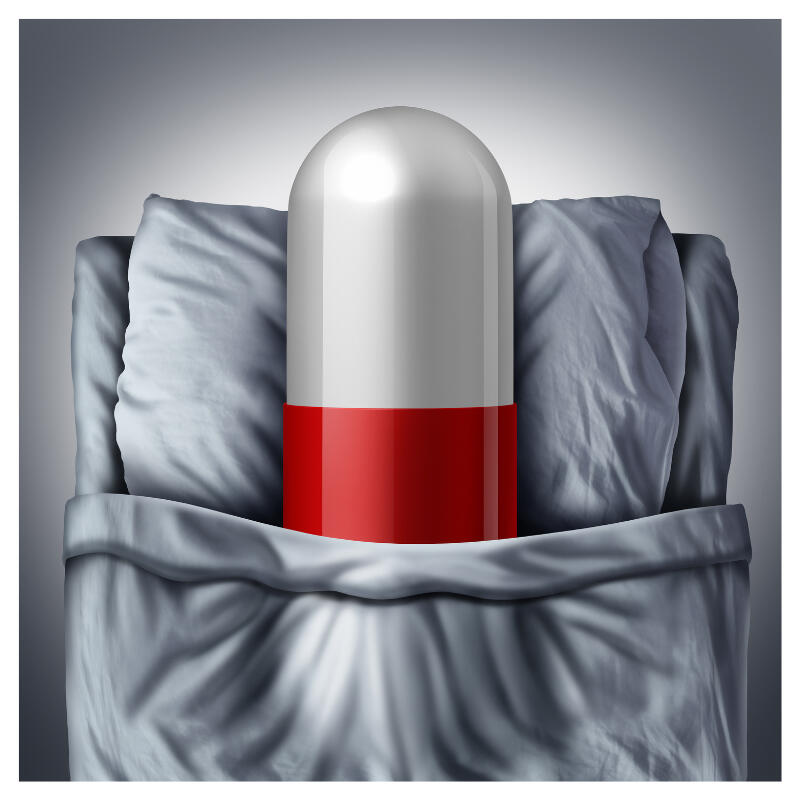 A supplement capsule in a bed - 4GREATSLEEP Review